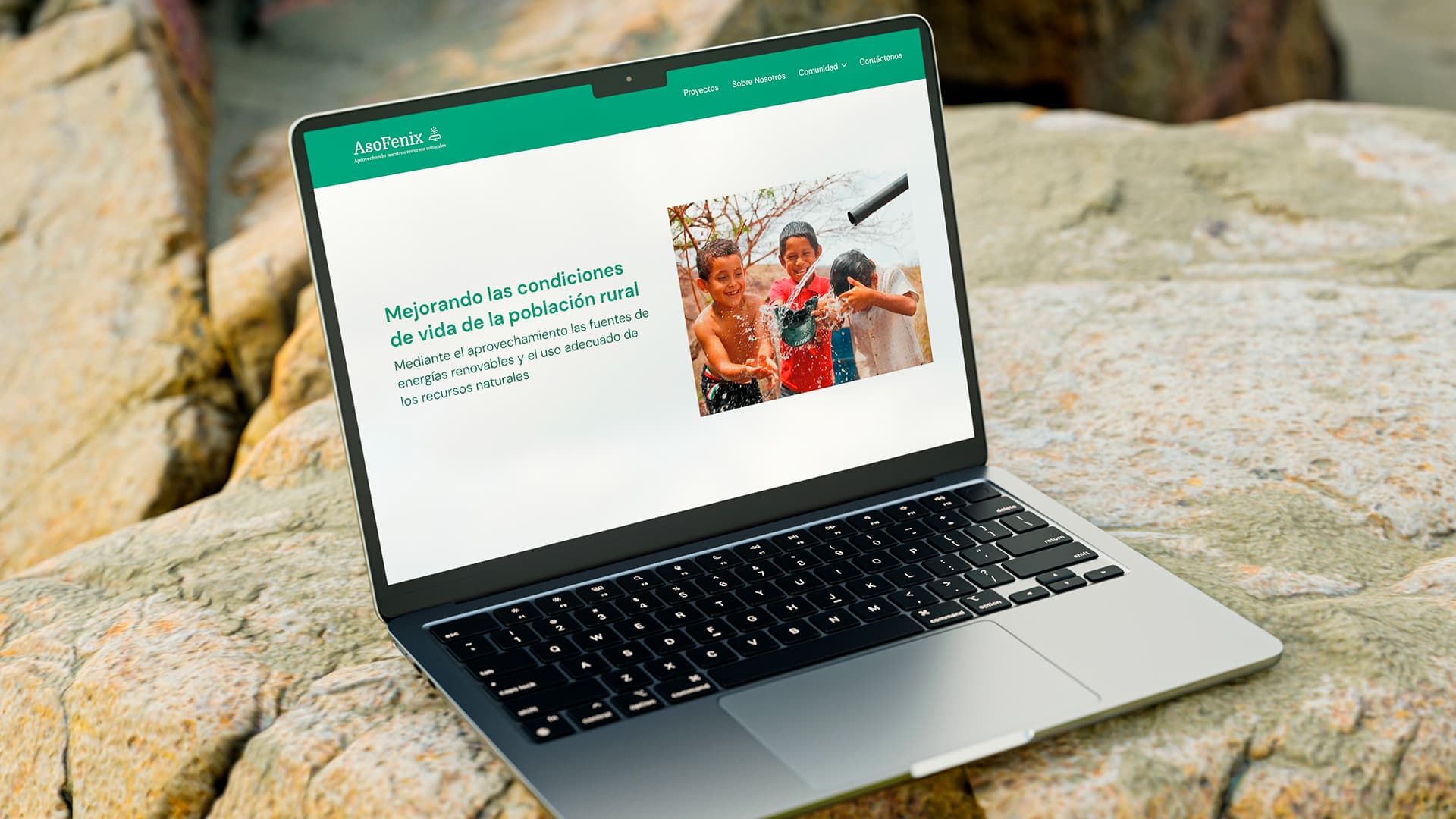 Website built for partner organization AsoFénix, shown on a laptop.